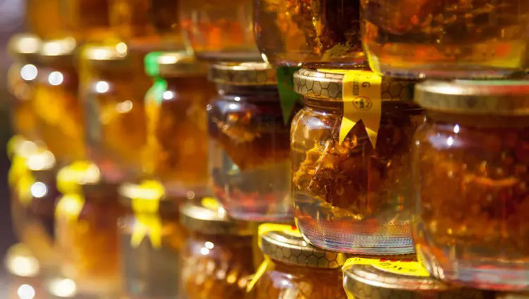 Une belle invention : le distributeur automatique de pots de miel